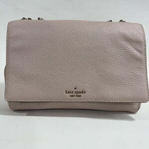 Kate Spade Briar Lane Emelyn crossbody bag in a light pink pebbled leather.